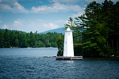 Herrick Cove Light by Rocky Shoreline of Lake Sunapee